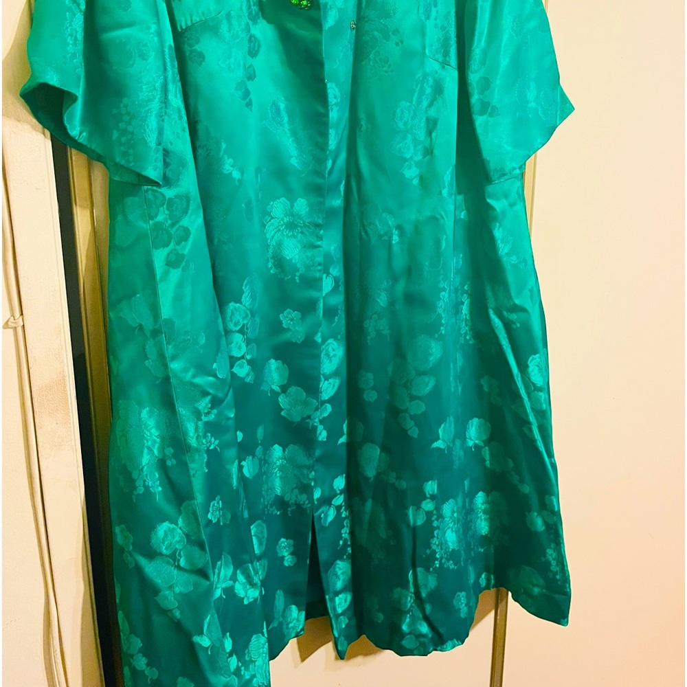 I am selling a beautiful green dress with coat